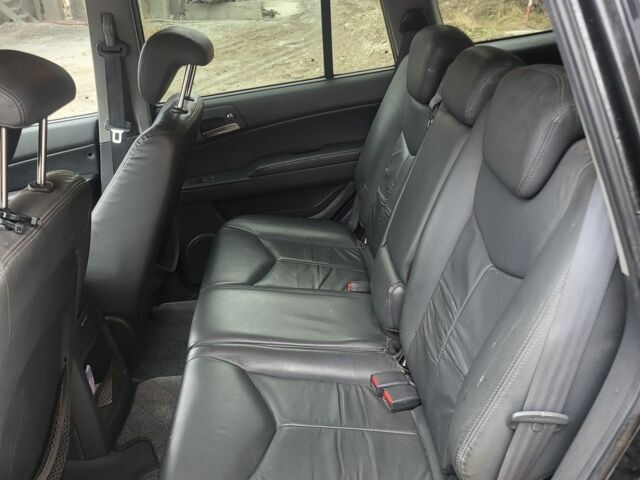 Черный Cанг Йонг Кирон, объемом двигателя 2 л и пробегом 221 тыс. км за 3500 $, фото 4 на Automoto.ua