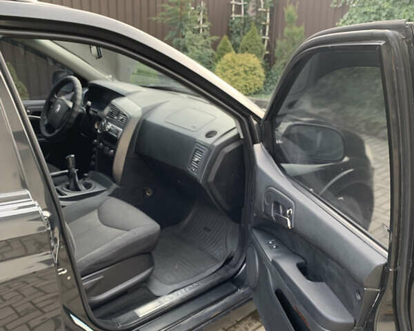 Черный Cанг Йонг Кирон, объемом двигателя 2 л и пробегом 330 тыс. км за 4950 $, фото 10 на Automoto.ua