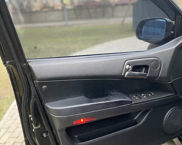 Черный Cанг Йонг Кирон, объемом двигателя 2 л и пробегом 335 тыс. км за 4700 $, фото 9 на Automoto.ua