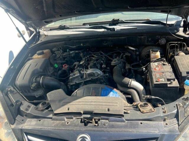 Чорний Cанг Йонг Kyron, об'ємом двигуна 2 л та пробігом 161 тис. км за 3150 $, фото 11 на Automoto.ua