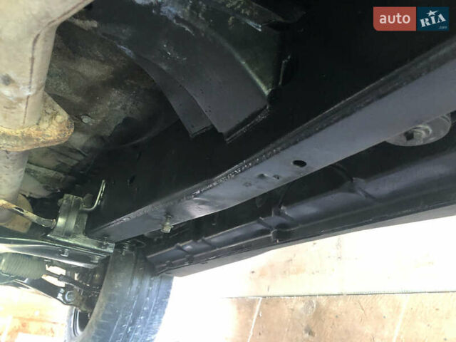 Чорний Cанг Йонг Kyron, об'ємом двигуна 2 л та пробігом 258 тис. км за 7299 $, фото 14 на Automoto.ua