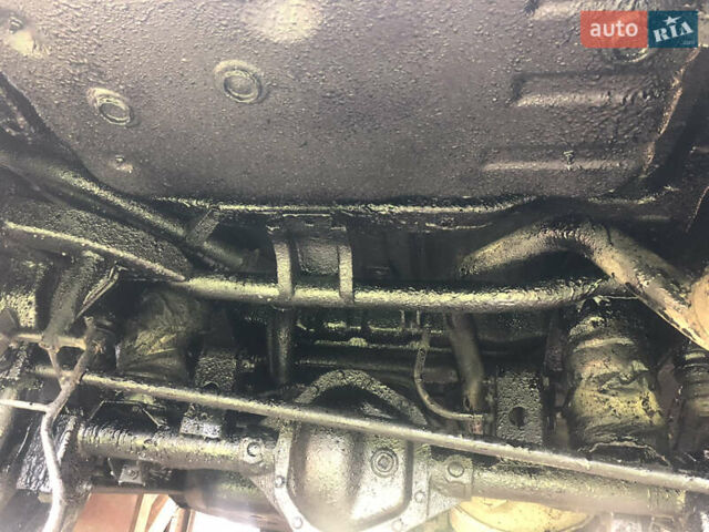 Чорний Cанг Йонг Kyron, об'ємом двигуна 2 л та пробігом 258 тис. км за 7299 $, фото 11 на Automoto.ua