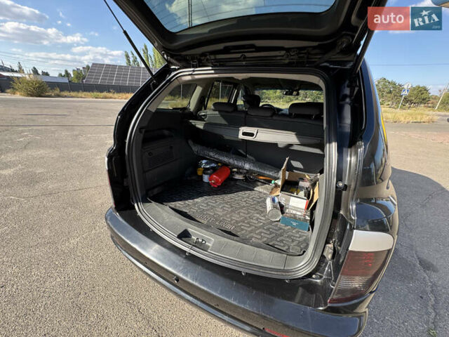 Чорний Cанг Йонг Kyron, об'ємом двигуна 2 л та пробігом 147 тис. км за 8500 $, фото 17 на Automoto.ua