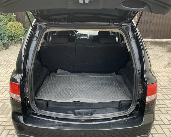 Черный Cанг Йонг Кирон, объемом двигателя 2 л и пробегом 330 тыс. км за 4950 $, фото 8 на Automoto.ua