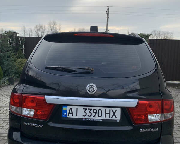 Черный Cанг Йонг Кирон, объемом двигателя 2 л и пробегом 330 тыс. км за 4950 $, фото 4 на Automoto.ua