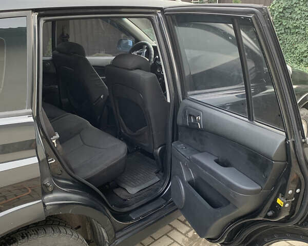 Черный Cанг Йонг Кирон, объемом двигателя 2 л и пробегом 330 тыс. км за 4950 $, фото 9 на Automoto.ua