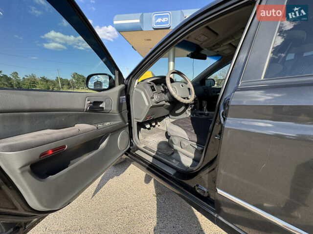 Чорний Cанг Йонг Kyron, об'ємом двигуна 2 л та пробігом 147 тис. км за 8500 $, фото 7 на Automoto.ua