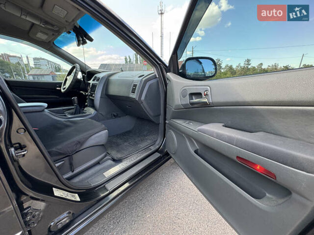 Чорний Cанг Йонг Kyron, об'ємом двигуна 2 л та пробігом 147 тис. км за 8500 $, фото 23 на Automoto.ua