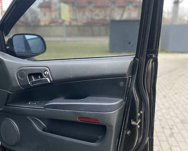 Черный Cанг Йонг Кирон, объемом двигателя 2 л и пробегом 335 тыс. км за 4700 $, фото 15 на Automoto.ua