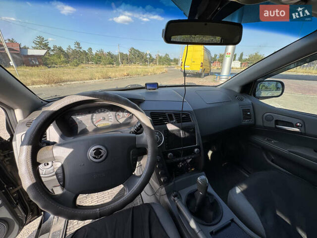 Чорний Cанг Йонг Kyron, об'ємом двигуна 2 л та пробігом 147 тис. км за 8500 $, фото 12 на Automoto.ua