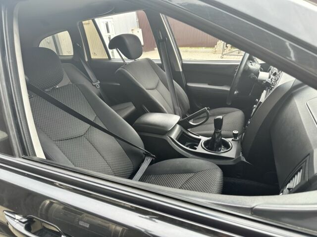 Чорний Cанг Йонг Kyron, об'ємом двигуна 2 л та пробігом 258 тис. км за 7299 $, фото 2 на Automoto.ua