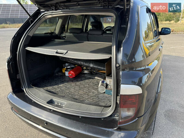 Чорний Cанг Йонг Kyron, об'ємом двигуна 2 л та пробігом 147 тис. км за 8500 $, фото 19 на Automoto.ua