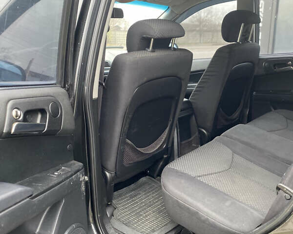 Черный Cанг Йонг Кирон, объемом двигателя 2 л и пробегом 335 тыс. км за 4700 $, фото 10 на Automoto.ua