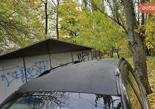 Черный Cанг Йонг Кирон, объемом двигателя 2 л и пробегом 284 тыс. км за 5000 $, фото 9 на Automoto.ua