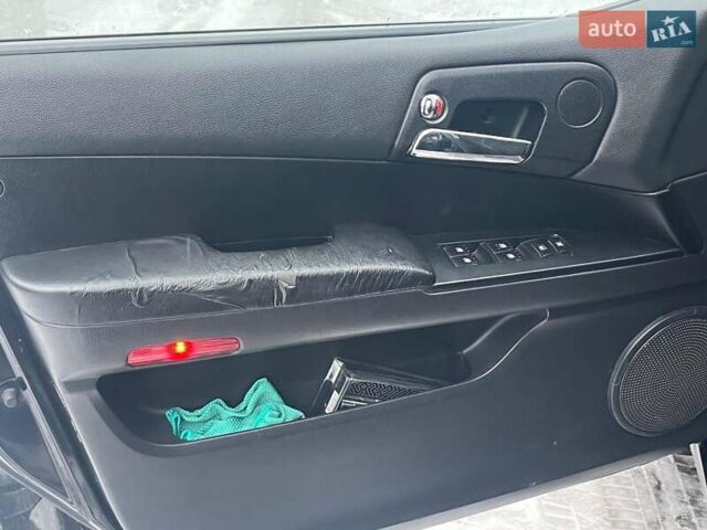 Чорний Cанг Йонг Kyron, об'ємом двигуна 2 л та пробігом 285 тис. км за 4490 $, фото 14 на Automoto.ua