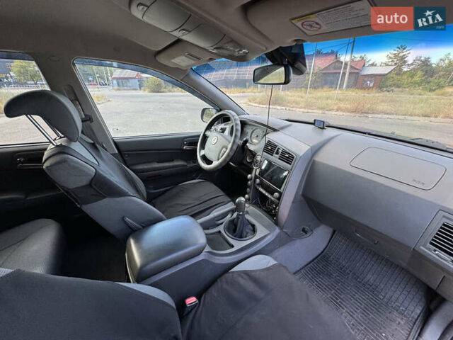 Чорний Cанг Йонг Kyron, об'ємом двигуна 2 л та пробігом 147 тис. км за 8500 $, фото 24 на Automoto.ua