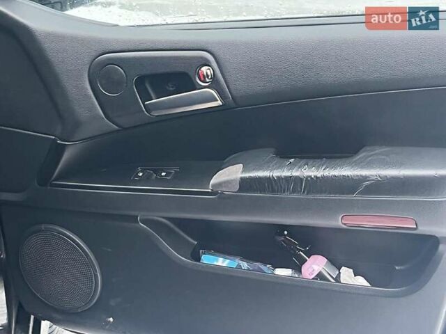 Чорний Cанг Йонг Kyron, об'ємом двигуна 2 л та пробігом 285 тис. км за 4490 $, фото 30 на Automoto.ua