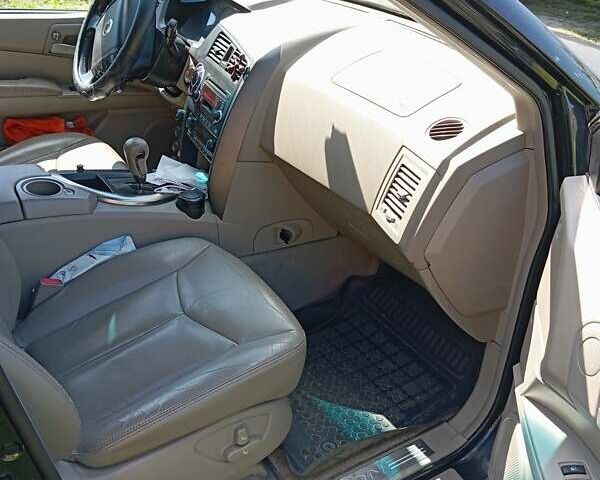 Черный Cанг Йонг Кирон, объемом двигателя 2 л и пробегом 146 тыс. км за 5800 $, фото 6 на Automoto.ua