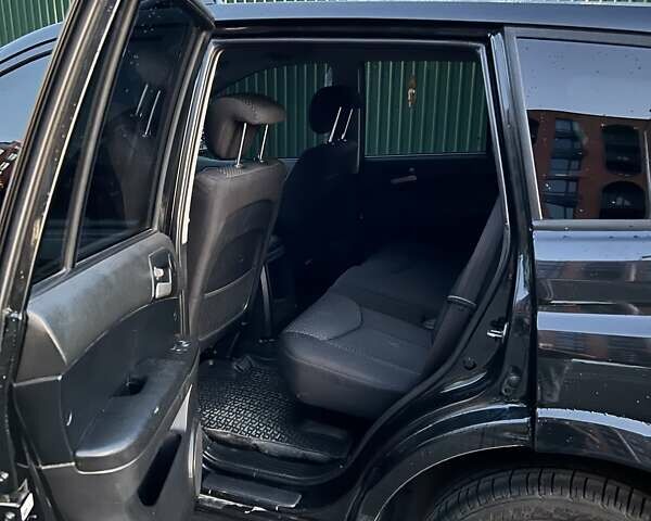 Чорний Cанг Йонг Kyron, об'ємом двигуна 2 л та пробігом 147 тис. км за 6700 $, фото 20 на Automoto.ua