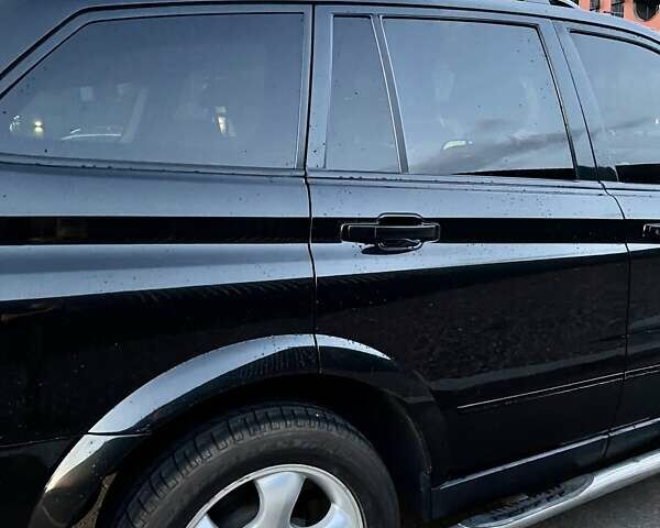 Чорний Cанг Йонг Kyron, об'ємом двигуна 2 л та пробігом 147 тис. км за 6700 $, фото 10 на Automoto.ua