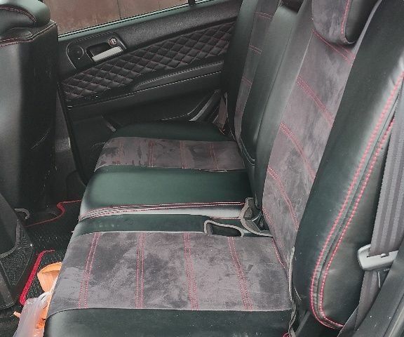 Черный Cанг Йонг Кирон, объемом двигателя 2 л и пробегом 172 тыс. км за 7143 $, фото 3 на Automoto.ua