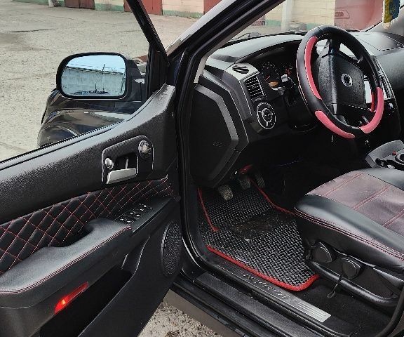 Черный Cанг Йонг Кирон, объемом двигателя 2 л и пробегом 172 тыс. км за 7143 $, фото 4 на Automoto.ua