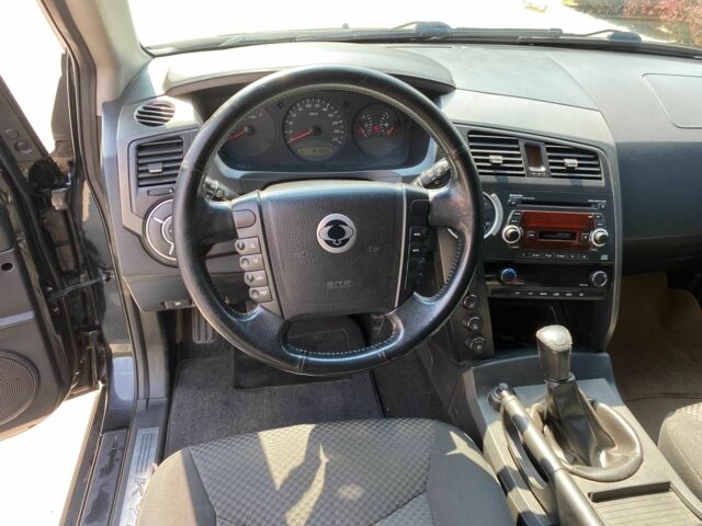 Чорний Cанг Йонг Kyron, об'ємом двигуна 2 л та пробігом 162 тис. км за 7200 $, фото 9 на Automoto.ua