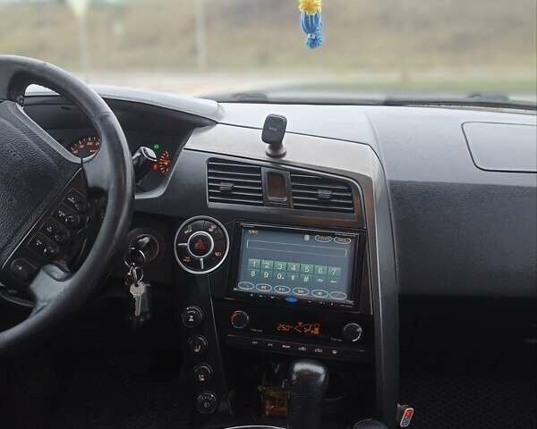 Чорний Cанг Йонг Kyron, об'ємом двигуна 2 л та пробігом 282 тис. км за 6500 $, фото 12 на Automoto.ua