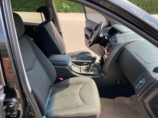 Чорний Cанг Йонг Kyron, об'ємом двигуна 2 л та пробігом 162 тис. км за 7200 $, фото 12 на Automoto.ua