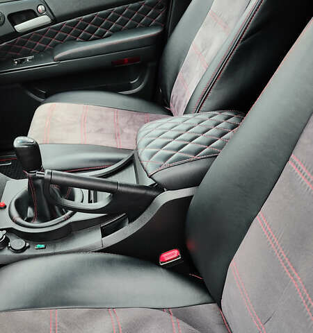 Чорний Cанг Йонг Kyron, об'ємом двигуна 2 л та пробігом 174 тис. км за 7000 $, фото 11 на Automoto.ua