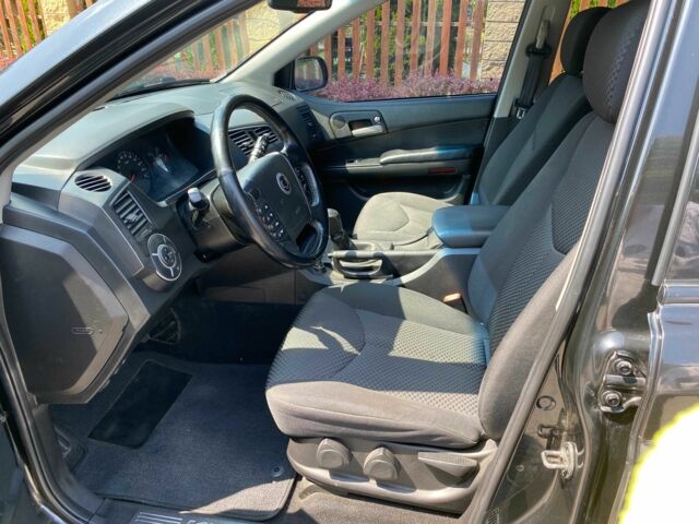 Чорний Cанг Йонг Kyron, об'ємом двигуна 2 л та пробігом 162 тис. км за 7200 $, фото 8 на Automoto.ua