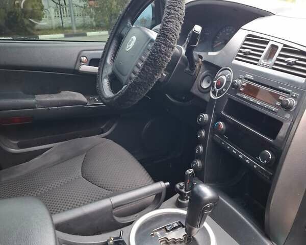 Черный Cанг Йонг Кирон, объемом двигателя 2.3 л и пробегом 200 тыс. км за 6350 $, фото 6 на Automoto.ua