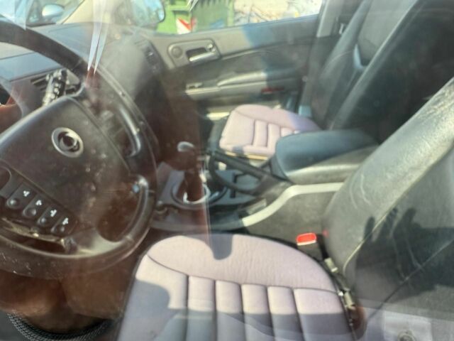 Черный Cанг Йонг Кирон, объемом двигателя 2 л и пробегом 170 тыс. км за 4069 $, фото 5 на Automoto.ua