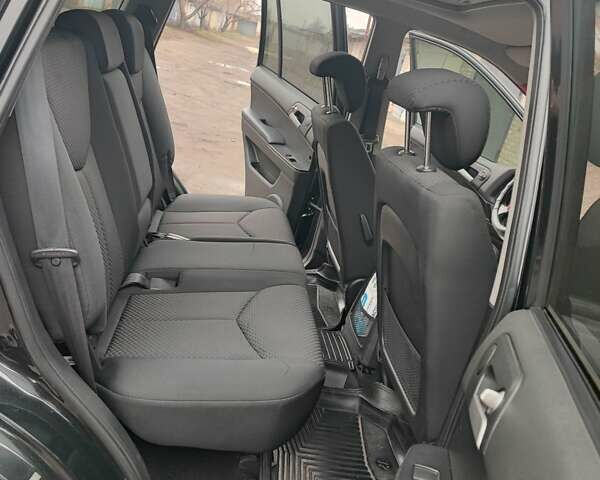 Чорний Cанг Йонг Kyron, об'ємом двигуна 2 л та пробігом 62 тис. км за 8500 $, фото 20 на Automoto.ua