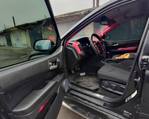 Чорний Cанг Йонг Kyron, об'ємом двигуна 2 л та пробігом 62 тис. км за 8500 $, фото 18 на Automoto.ua