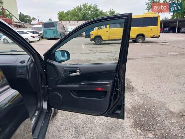 Черный Cанг Йонг Кирон, объемом двигателя 2 л и пробегом 220 тыс. км за 5999 $, фото 17 на Automoto.ua