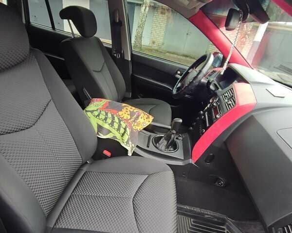 Чорний Cанг Йонг Kyron, об'ємом двигуна 2 л та пробігом 62 тис. км за 8500 $, фото 13 на Automoto.ua