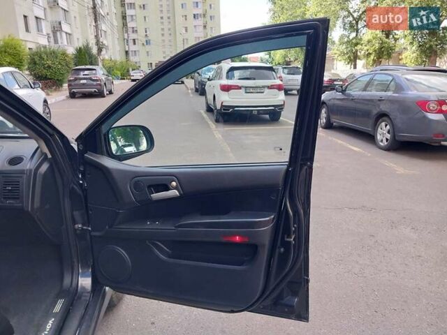 Черный Cанг Йонг Кирон, объемом двигателя 2 л и пробегом 220 тыс. км за 5999 $, фото 17 на Automoto.ua