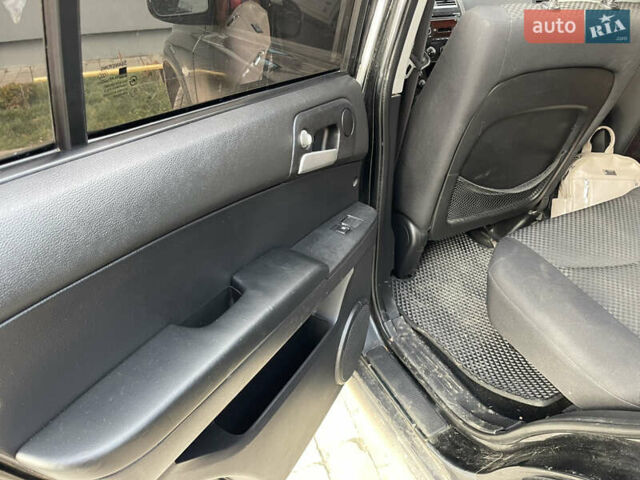 Чорний Cанг Йонг Kyron, об'ємом двигуна 2 л та пробігом 320 тис. км за 6700 $, фото 3 на Automoto.ua