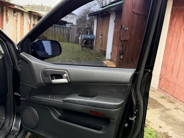 Чорний Cанг Йонг Kyron, об'ємом двигуна 2.3 л та пробігом 113 тис. км за 7500 $, фото 15 на Automoto.ua