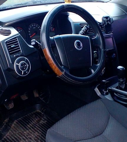 Черный Cанг Йонг Кирон, объемом двигателя 2 л и пробегом 147 тыс. км за 9000 $, фото 4 на Automoto.ua