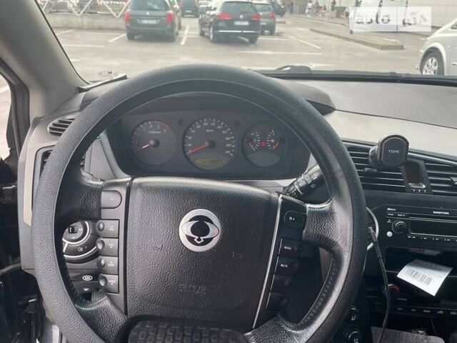 Чорний Cанг Йонг Kyron, об'ємом двигуна 2 л та пробігом 143 тис. км за 9300 $, фото 7 на Automoto.ua