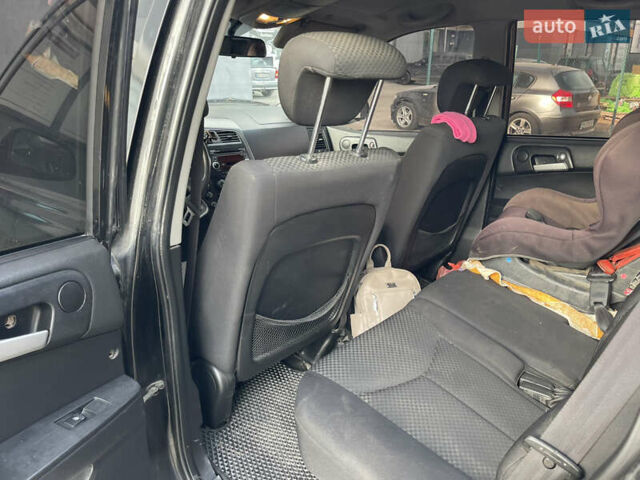 Чорний Cанг Йонг Kyron, об'ємом двигуна 2 л та пробігом 320 тис. км за 6700 $, фото 4 на Automoto.ua