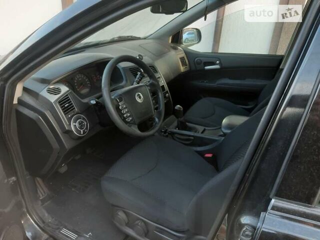 Чорний Cанг Йонг Kyron, об'ємом двигуна 2 л та пробігом 190 тис. км за 6800 $, фото 5 на Automoto.ua