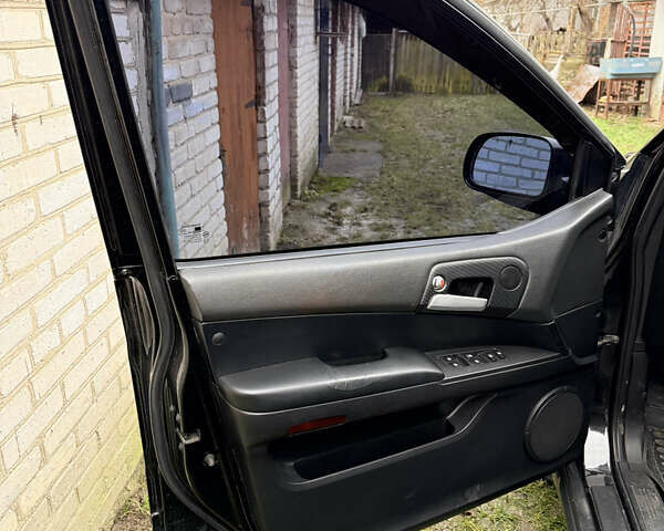 Чорний Cанг Йонг Kyron, об'ємом двигуна 2.3 л та пробігом 113 тис. км за 7500 $, фото 13 на Automoto.ua