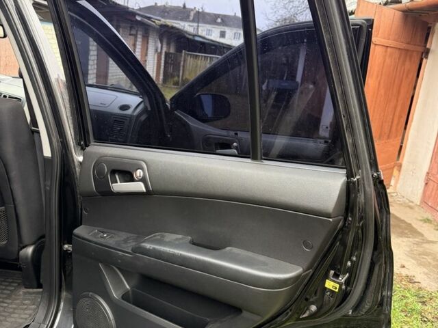 Чорний Cанг Йонг Kyron, об'ємом двигуна 2.3 л та пробігом 113 тис. км за 7500 $, фото 18 на Automoto.ua