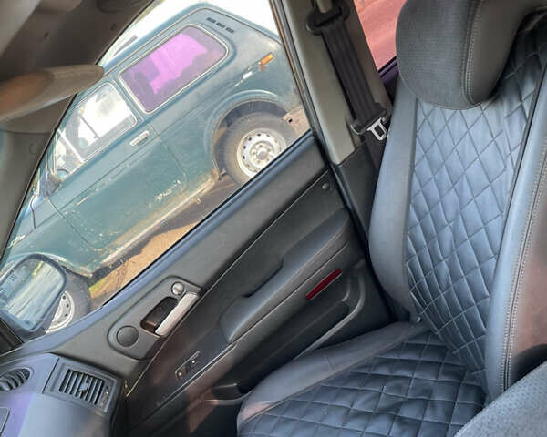 Черный Cанг Йонг Кирон, объемом двигателя 2 л и пробегом 220 тыс. км за 4250 $, фото 9 на Automoto.ua