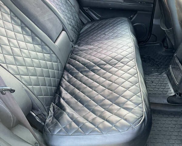 Черный Cанг Йонг Кирон, объемом двигателя 2 л и пробегом 220 тыс. км за 4250 $, фото 10 на Automoto.ua