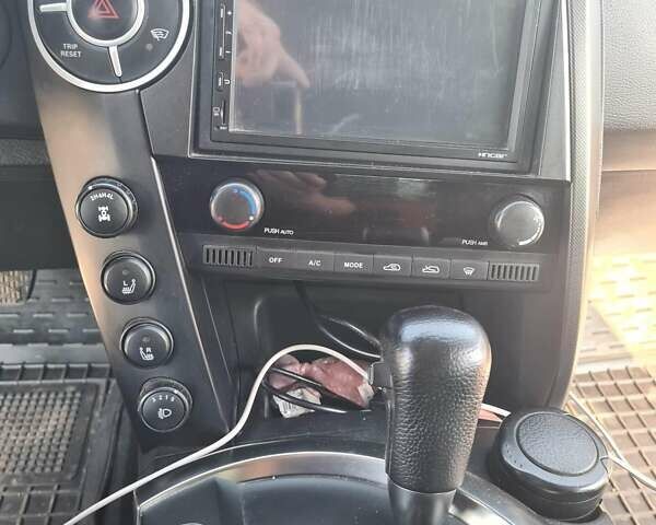 Чорний Cанг Йонг Kyron, об'ємом двигуна 2 л та пробігом 133 тис. км за 10000 $, фото 19 на Automoto.ua