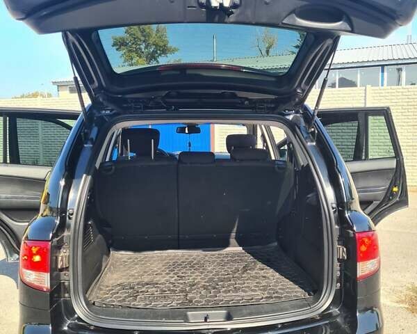 Чорний Cанг Йонг Kyron, об'ємом двигуна 2 л та пробігом 133 тис. км за 10000 $, фото 27 на Automoto.ua